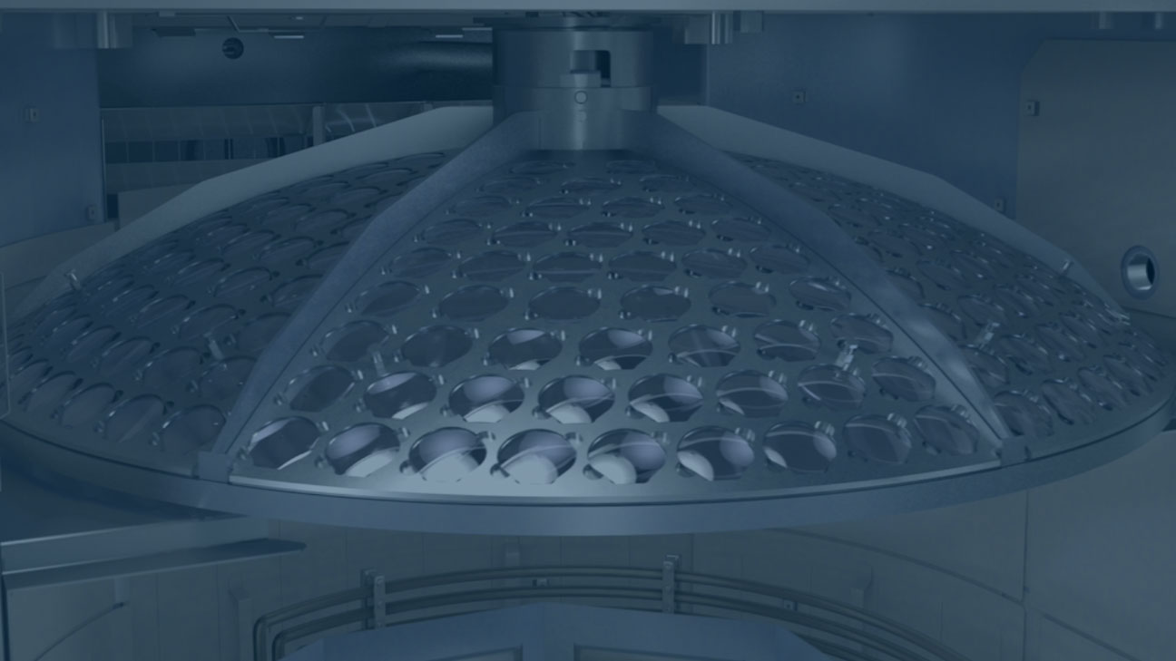 Large dome-shaped industrial machine component with multiple circular openings